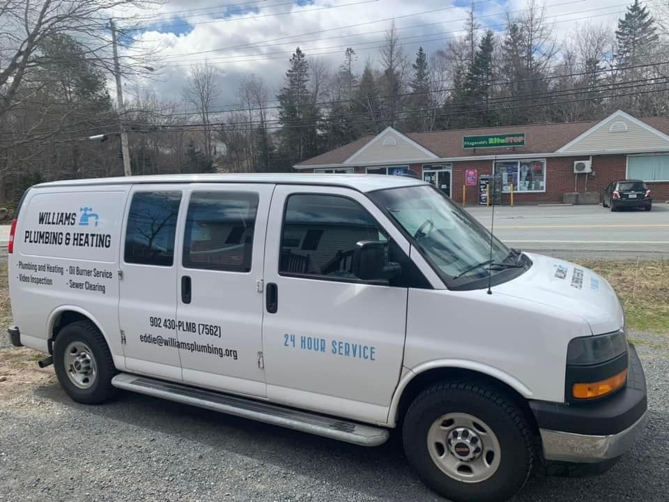 Williams Plumbing & Heating service van marked 24 hour service